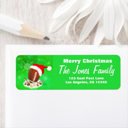 サンタハットと軽食で楽しいクリスマスフットボール ラベル (インサイチュ)