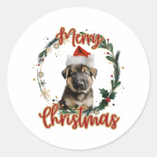 サンタハットに住むドイツのクリスマスシェパード ラウンドシール
