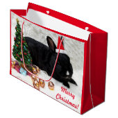 サンタハットに住むメリークリスマスバニーウサギ ラージペーパーバッグ (正面アングル)