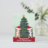 サンタハットに咲く二匹のコギのクリスマスツリー ポストカード (スタンド正面)