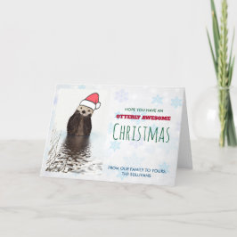 サンタハットのクリスマスを着たかわいいカワウソ カード