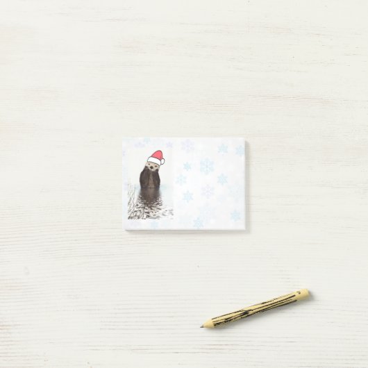 サンタハットのクリスマスを着たかわいいカワウソ ポストイット (デスク上)