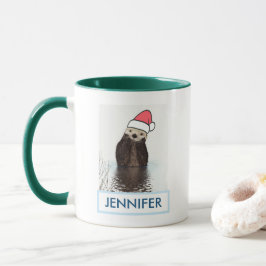 サンタハットのクリスマスを着たかわいいカワウソ マグカップ