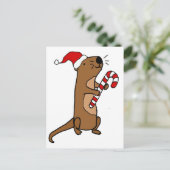 サンタハットのクリスマスアニメの可愛い海のオッター シーズンポストカード (スタンド正面)