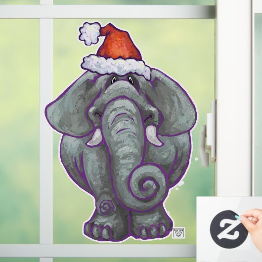 サンタハットのクリスマスウィンドウに象が付き添う ウィンドウサイン (ホーム)