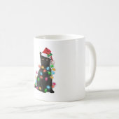 サンタハットのクリスマスライトを飾った黒猫 コーヒーマグカップ (正面右)