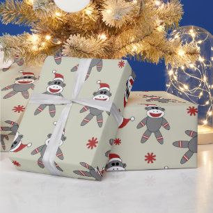 サンタハットのクリスマス用ラップを持つ靴下サル ラッピングペーパー
