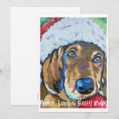 サンタハットのホリデーノートカードを持つ犬 ノートカード (正面/裏面)