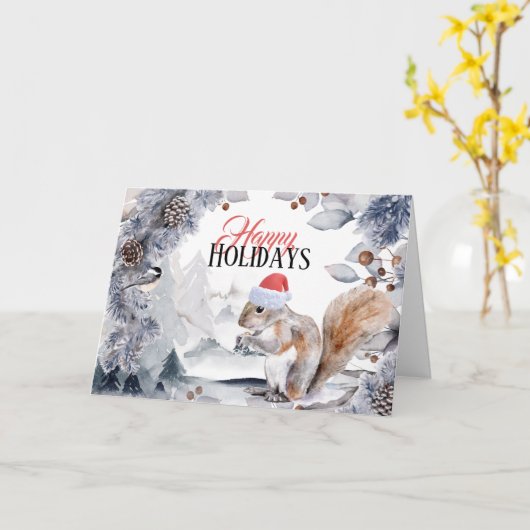 サンタハットの冬の森の風景を身に着けたリス カード (黄色い花)