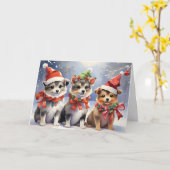 サンタハットを使ったかわいいクリスマスの子犬 カード (黄色い花)