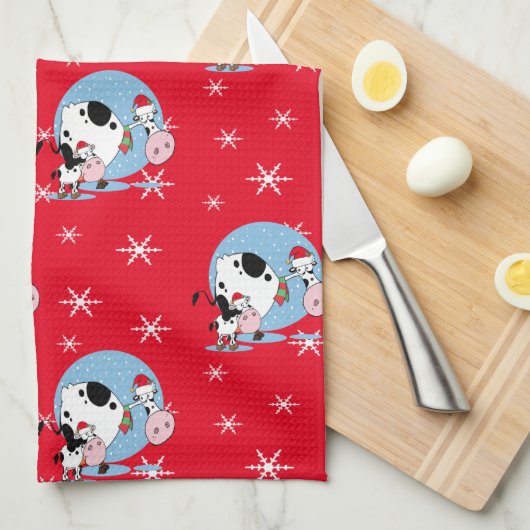 サンタハットを持つ国クリスマス牛 キッチンタオル (四つ折り)
