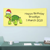 サンタハットを着たかわいい幸せ亀 横断幕 (トレードショー)