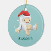 サンタハットを着たクリスマスイェティ人形 セラミックオーナメント (左)