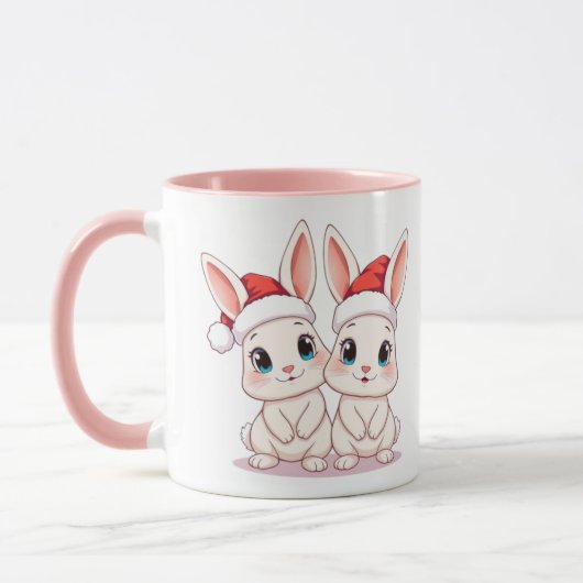 サンタハットを着た2匹のかわいいバニー マグカップ (左)