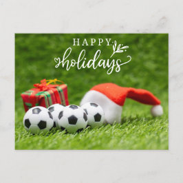 サンタハットクリスマスとサッカーのハッピーホリデー シーズンポストカード