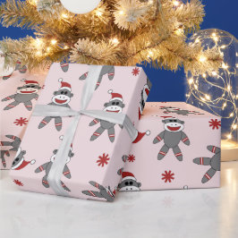 サンタハットピンクのクリスマス休暇を持つソックモンキー ラッピングペーパー
