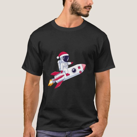 サンタハット宇宙飛行士ロケットクリスマスに乗る Tシャツ (正面)