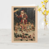 サンタビクトリアンとエンジェルスのクリスマスカード カード (黄色い花)