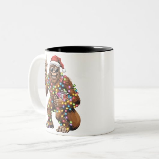 サンタビッグフットのクリスマスライトロックおもしろい ツートーンマグカップ (正面左)