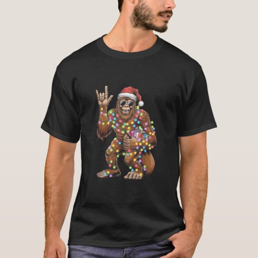 サンタビッグフットのクリスマスライトロックおもしろい Tシャツ (正面)