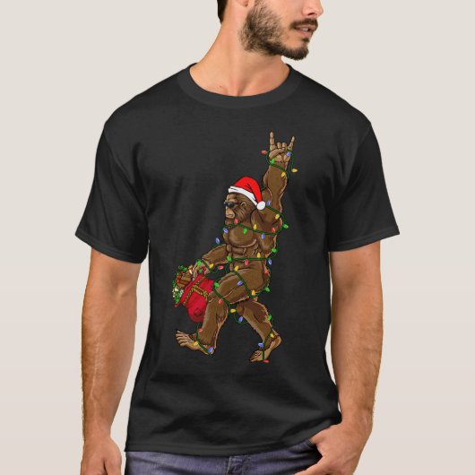 サンタビッグフートクリスマスライトロックサスクおもしろいック Tシャツ (正面)