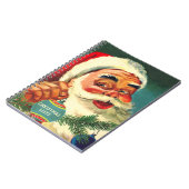 サンタファッションドクリスマスリストを笑う老人 ノートブック (左側)