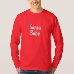 サンタベビー赤い雪タイポグラフィかわいいクリスマス Tシャツ