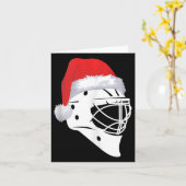 サンタホッケー選手のクリスマススポーツメリークリスマスホ カード (黄色い花)