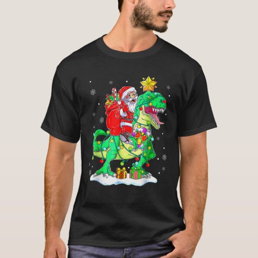 サンタライディング恐竜Tレックスクリスマスボーイズ男性Xma Tシャツ (正面)