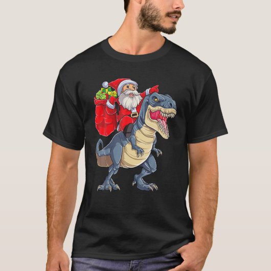 サンタライディング恐竜Tレックスクリスマスボーイズ男性Xma Tシャツ (正面)
