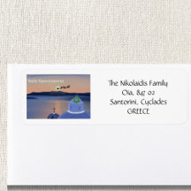 サンタリターンを伴うギリシャのサントリーニでのクリスマス