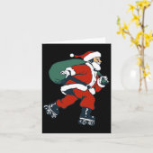 サンタローラスケートで滑るおもしろいクリスマススケートのキッズボーイ カード (黄色い花)