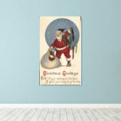 サンタ充填ストッキングからブリム キャンバスプリント (インサイチュ (ウッドフロア))