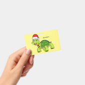 サンタ帽をかぶったかわいいカメ バッジ (手持ち)