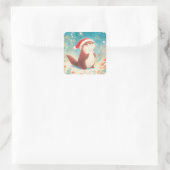サンタ帽をかぶったかわいいクリスマスのカワウソステッカー スクエアシール (バッグ)