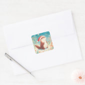 サンタ帽をかぶったかわいいクリスマスのカワウソステッカー スクエアシール (封筒)