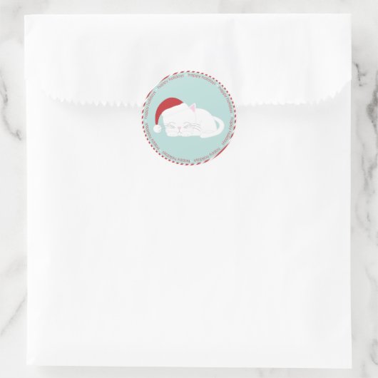 サンタ帽をかぶったネコの昼寝 ラウンドシール (バッグ)