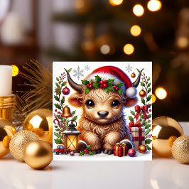 サンタ帽をかぶったハイランド・カウの祭りの装い シーズンカード