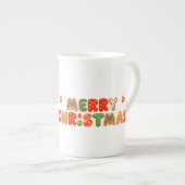 サンタ帽をかぶった元気な漫画の犬 ボーンチャイナマグカップ (正面右)