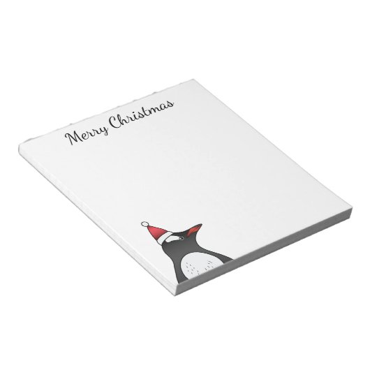 サンタ帽をかぶった可愛いGentooペンギン ノートパッド (アングル)