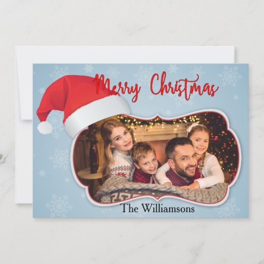 サンタ帽を被ったおしゃれなフレームで家族の写真を強調した、モダンなクリスマスカードのデザイン。お名前 シーズンカード (正面)