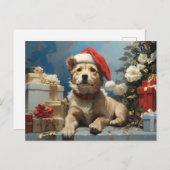 サンタ帽子と多くのギフトボックスを持つ犬 ポストカード (正面/裏面)