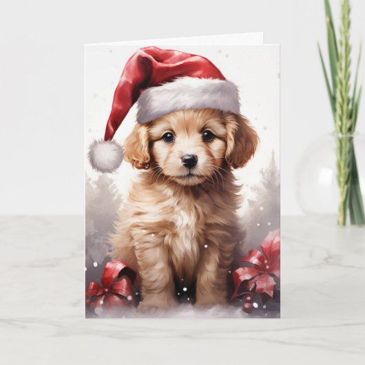 サンタ帽子のキュートなふわふわの子犬 クリスマス カード (正面)