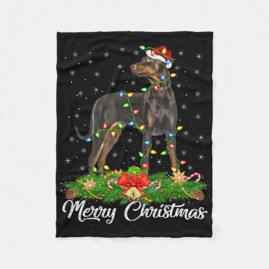 サンタ帽子のドーベルマンピンシャー クリスマスのイルミネーション フリースブランケット (正面)