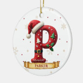 サンタ帽子の赤いクリスマス文字 P 名前 セラミックオーナメント (左)
