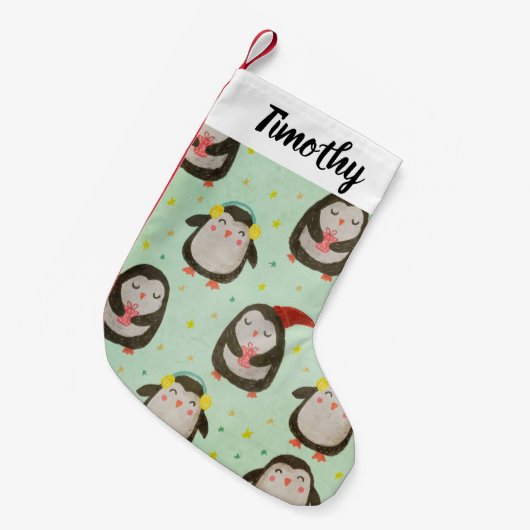 サンタ帽子をかぶったハッピーペンギンとイヤーマフ スモールクリスマスストッキング (正面 (吊り時))