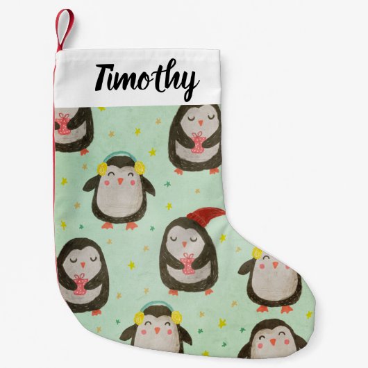 サンタ帽子をかぶったハッピーペンギンとイヤーマフ スモールクリスマスストッキング (正面)