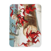 サンタ格言が丸太に滑る マグネット (縦)