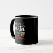 サンタ親愛がバーボンのクリスマス酒を持ってくる マグカップ (正面左)
