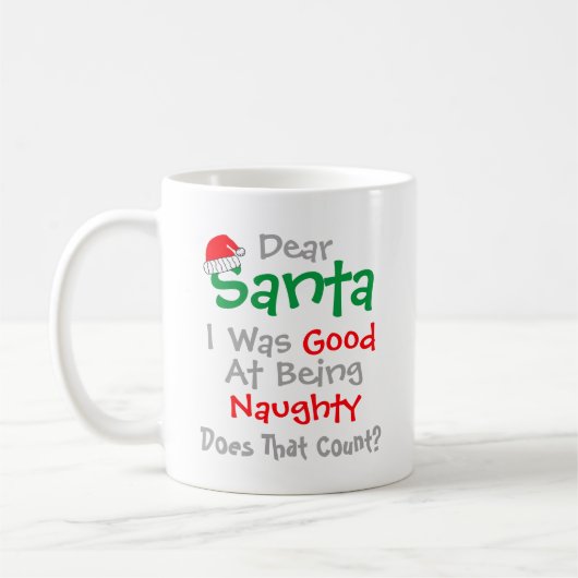 サンタ親愛:クリスマスがいけな上手 コーヒーマグカップ (左)